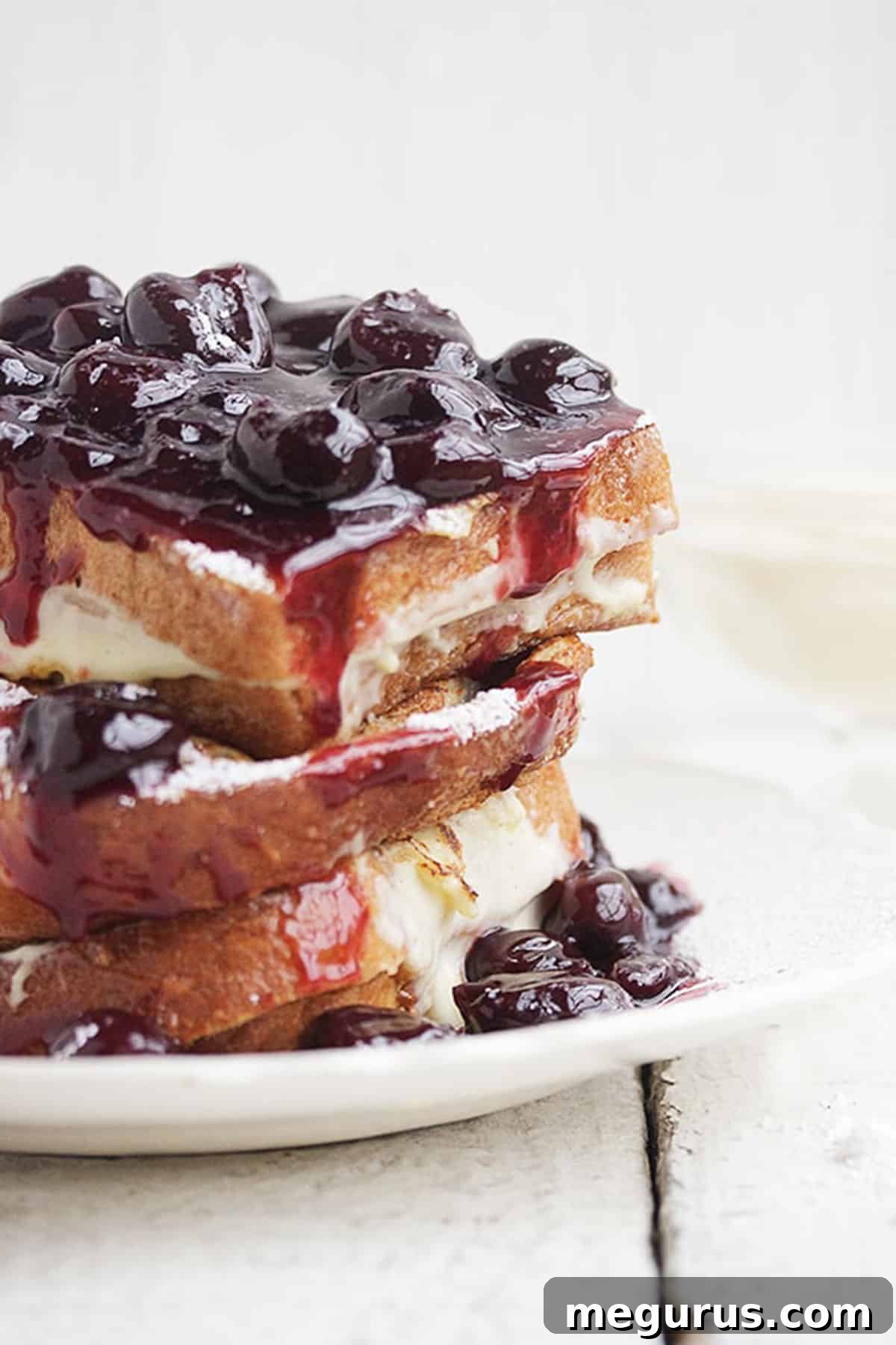 Close-up of Cherry French Toast with Vanilla Cream and Cherries