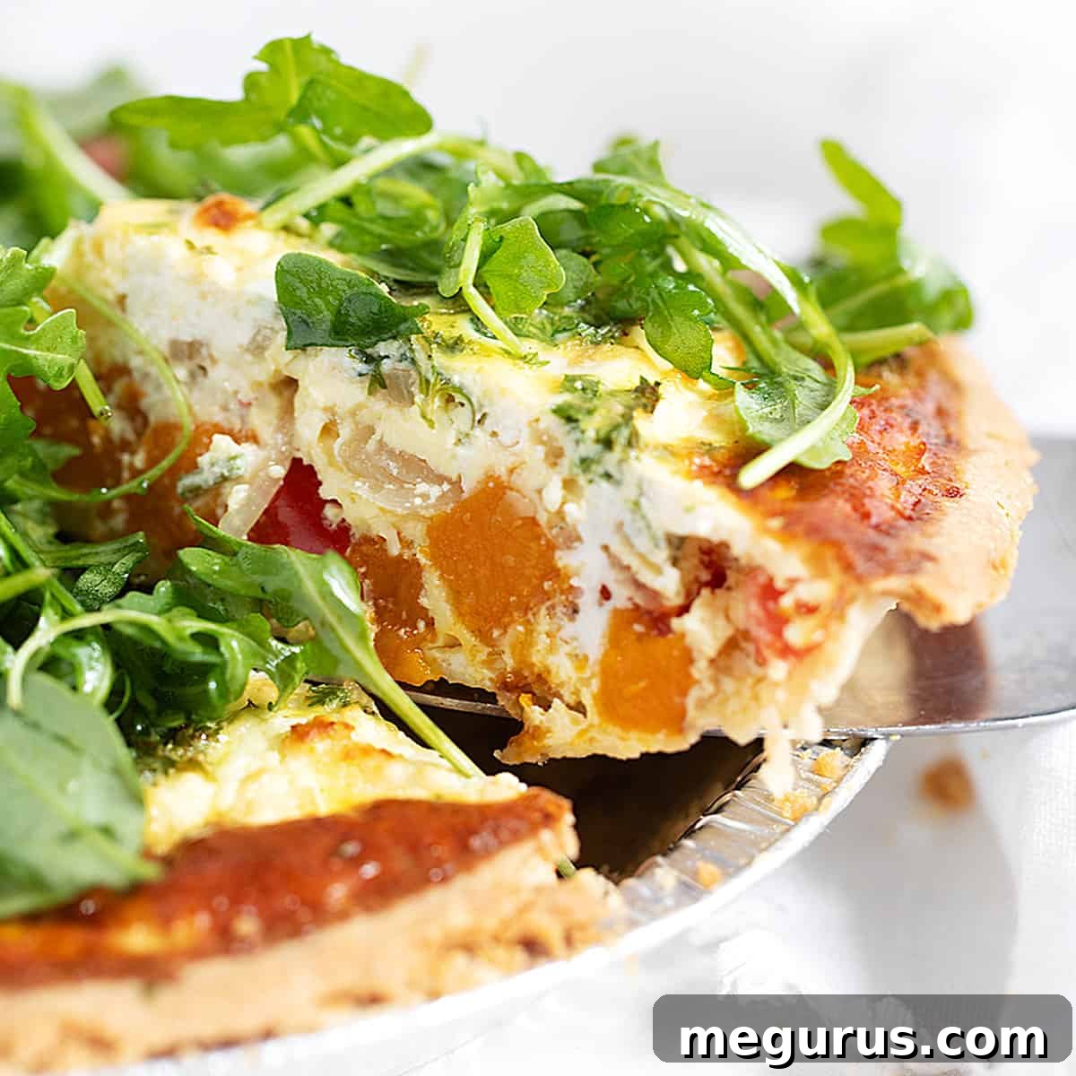 Butternut squash quiche sliced.