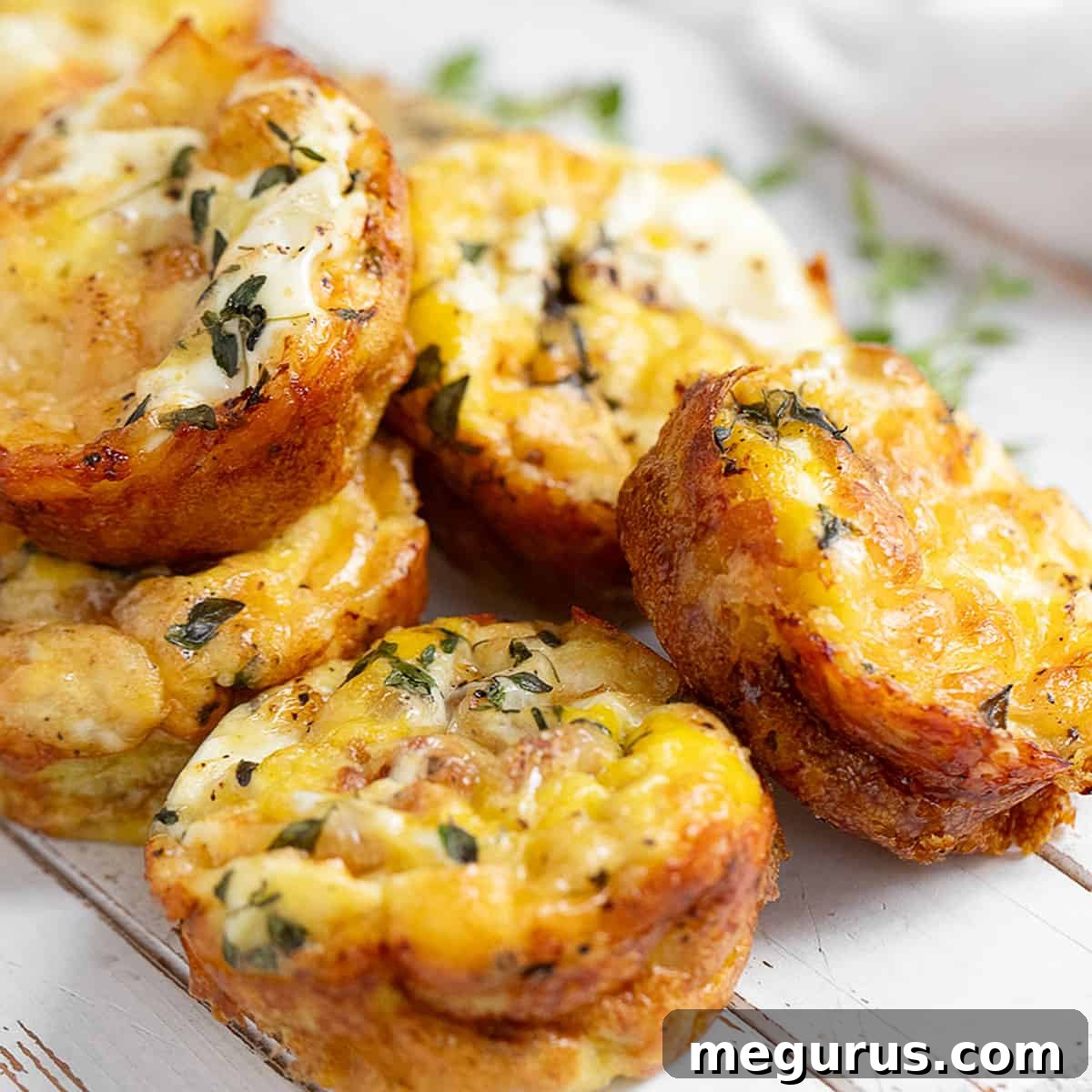 Crustless mini quiche on serving board.