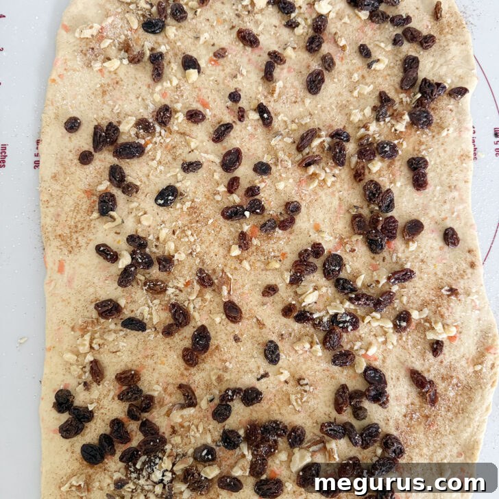 Dough topped with plump raisins and chopped walnuts.