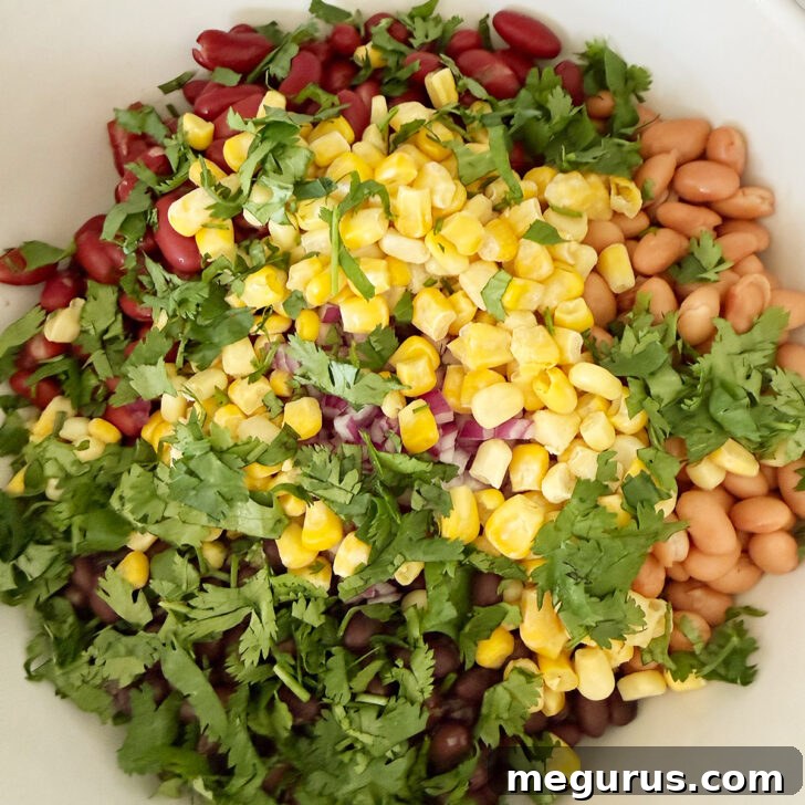 Cilantro added to the salad bowl.