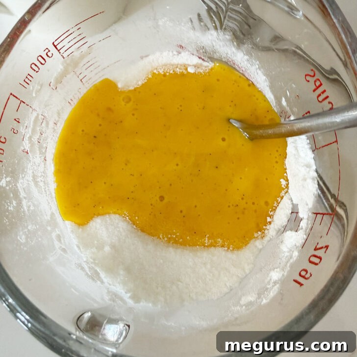 Wet and dry filling ingredients combined in a bowl.