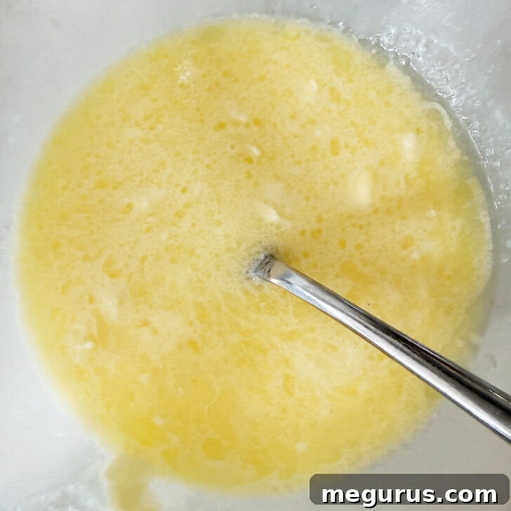 Wet ingredients mixed up in a bowl.